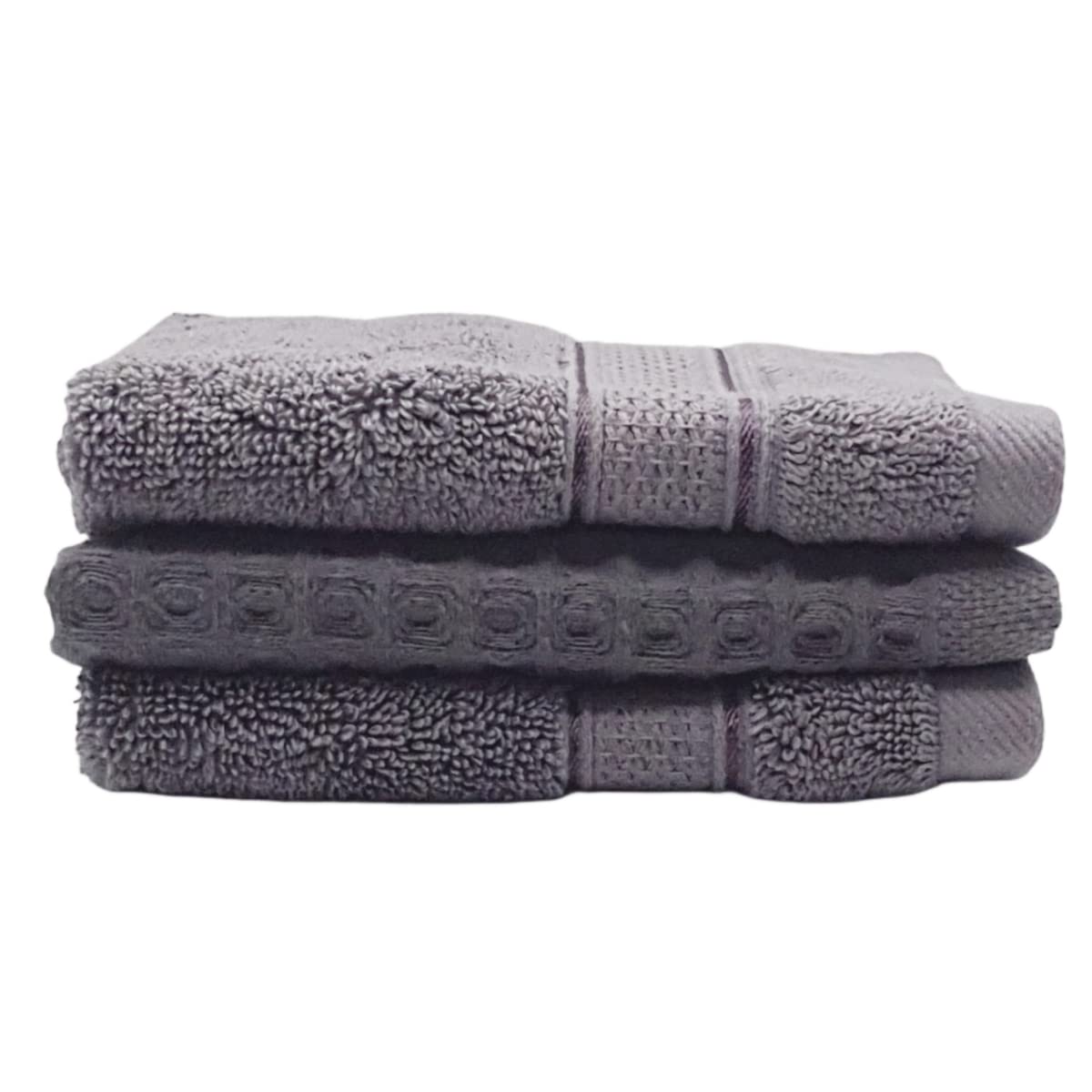 Stack of gray towels with textured surface on a white background