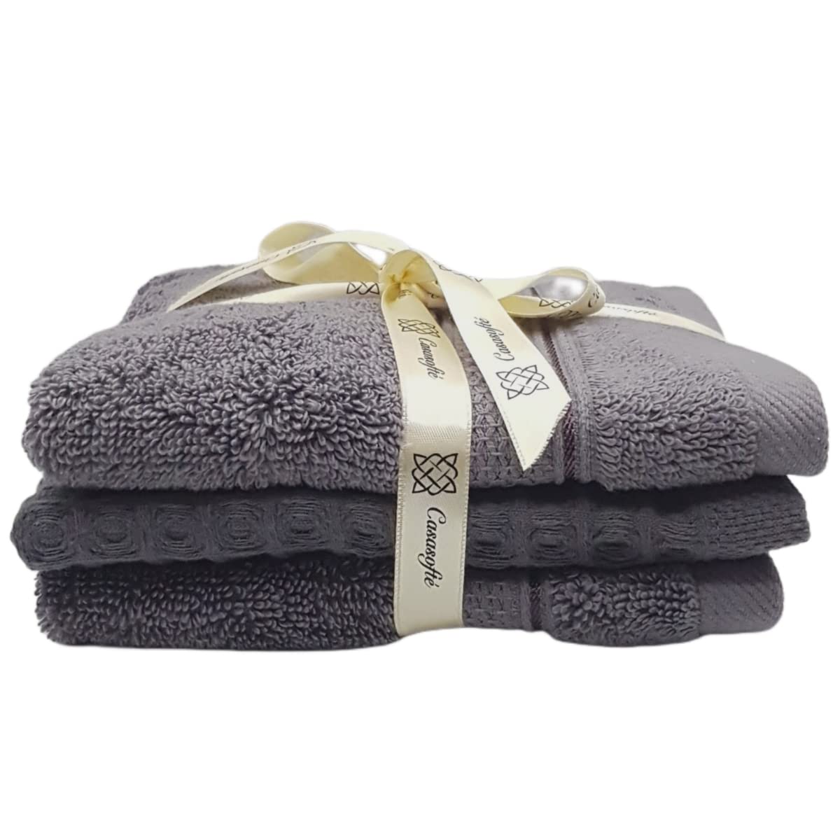 Stack of gray towels with a visible brand label on a white background