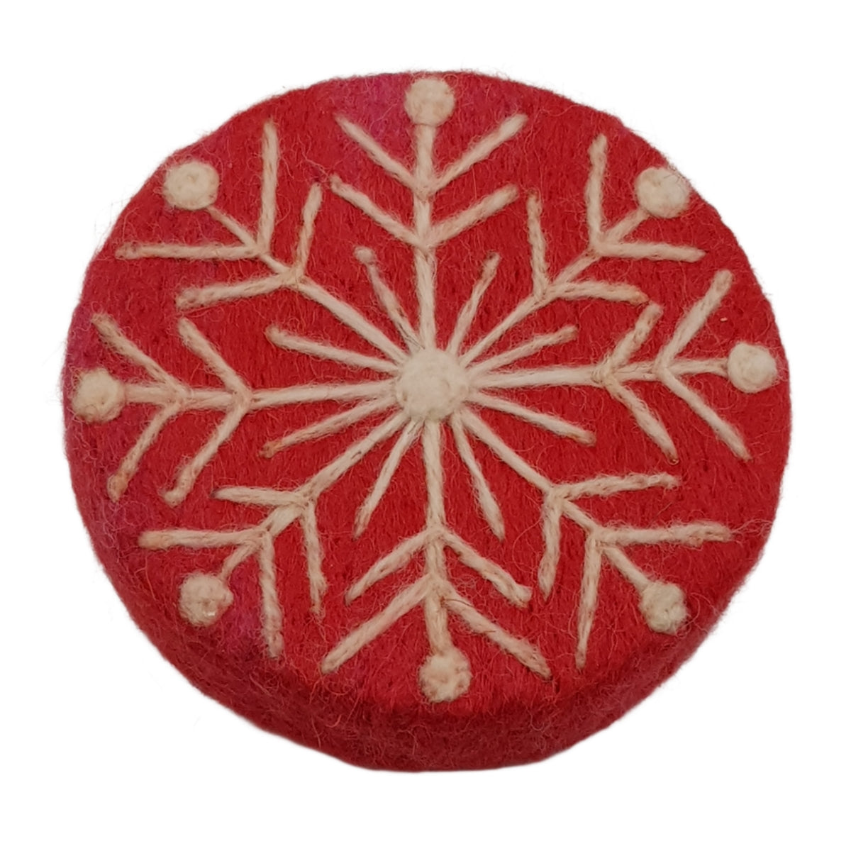 Red circular fabric patch with white snowflake pattern on a white background